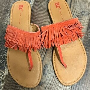 Orange fringe sandals